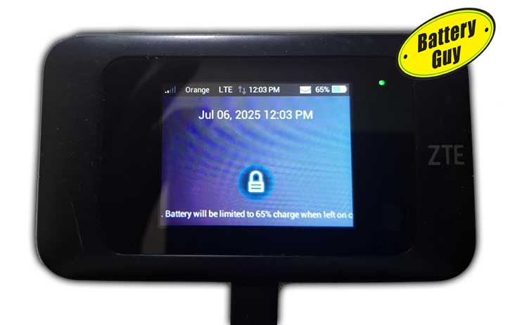 A battery powered WiFi router displaying a message that the internal charger is keeping the battery at 65% charge.